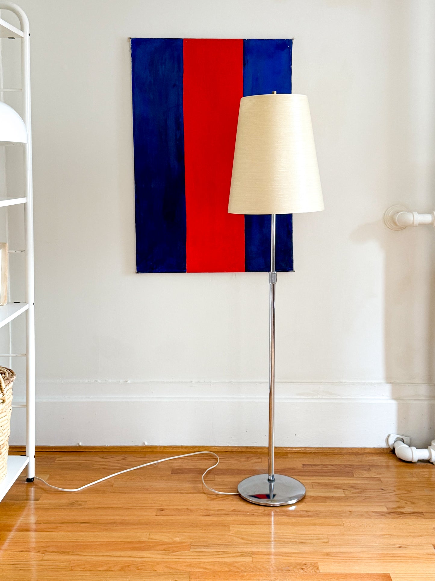 Adjustable chrome floor lamp by Lotte Lights