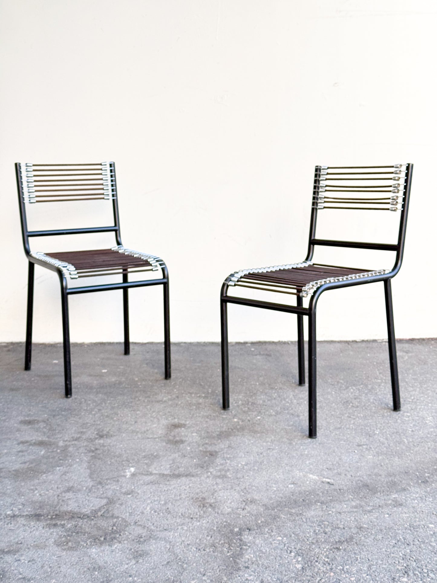 Pair of Sandows chairs by René Herbst for Ecart