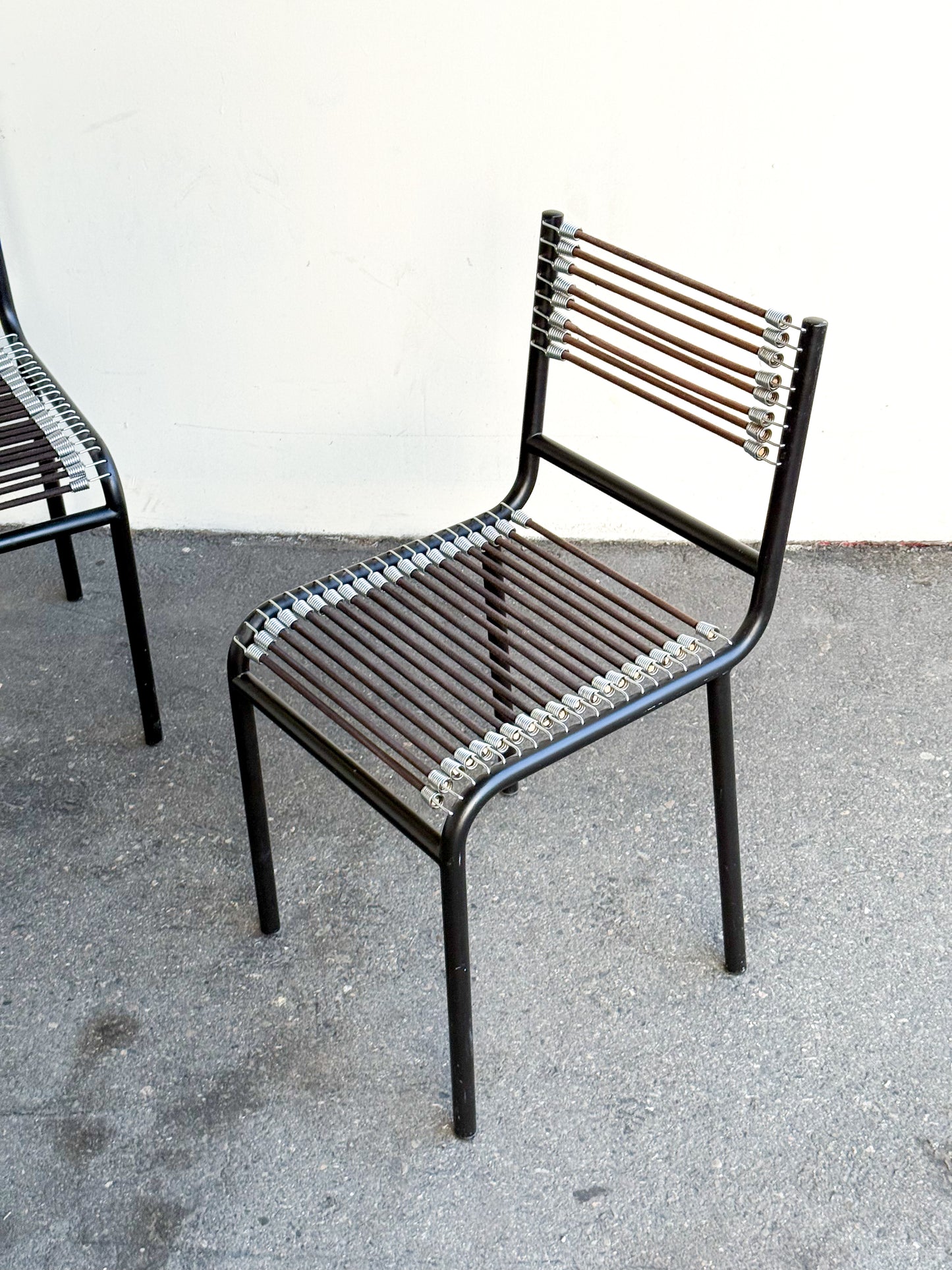 Pair of Sandows chairs by René Herbst for Ecart