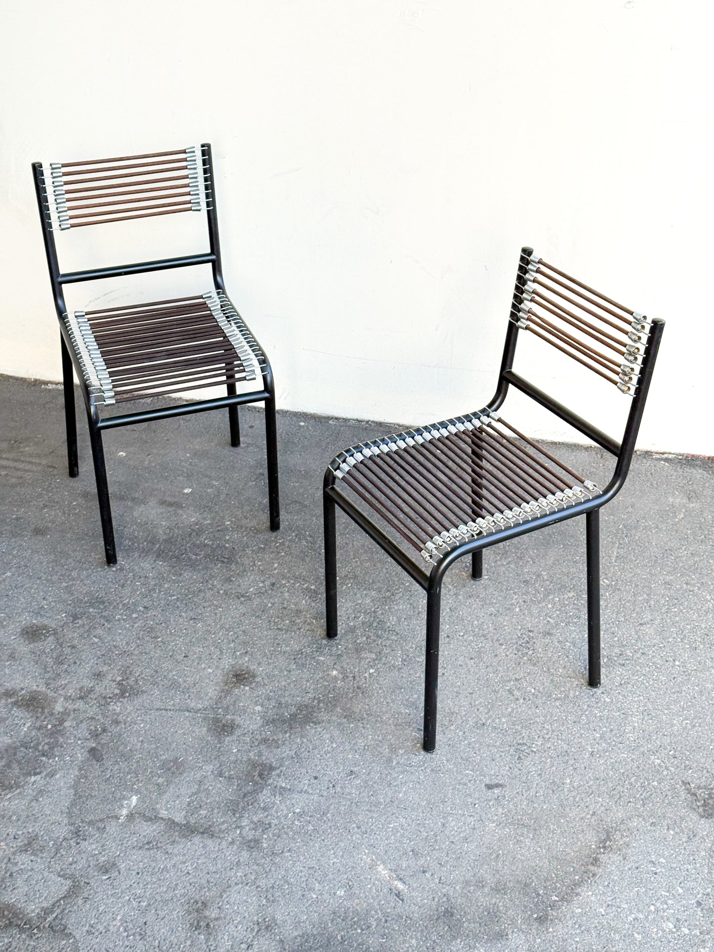 Pair of Sandows chairs by René Herbst for Ecart